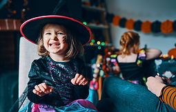 Young girl dressed up in fancy dress for halloween