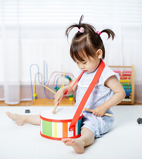 Toddler Playing Drums