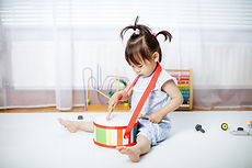 Toddler Playing Drums