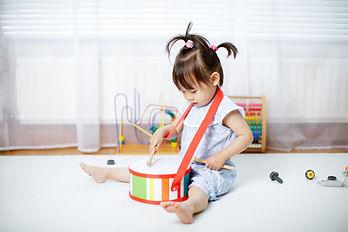 Toddler Playing Drums
