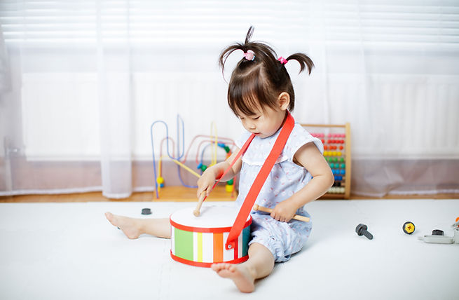 Toddler Playing Drums