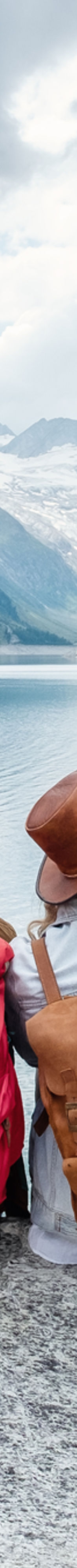 Young people at the mountain lake