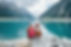 Young people at the mountain lake