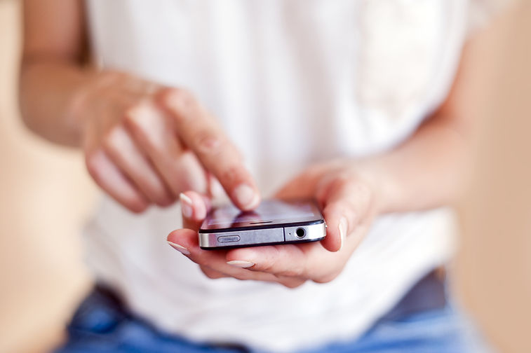 Woman using a touchscreen smartphone