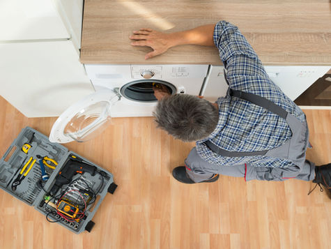 Clogged dryer lint buildup inside a metal vent duct