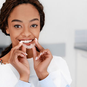 Woman Holding Retainer
