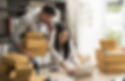 A man and a woman receiving online orders