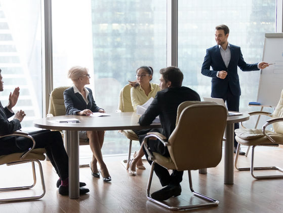 People sitting at the table on a business meeting.