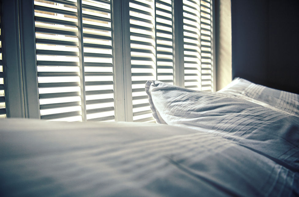 Morning rays spill over the pillows