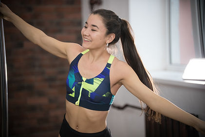 Smiling Woman Stretching