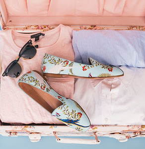 Pastel suitcase contents