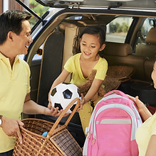 Happy family preparing for a trip