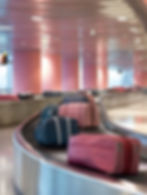 Luggage on Conveyor Belt