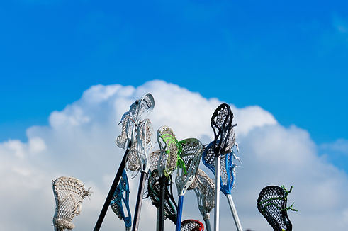 Lacrosse Sticks in Air