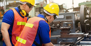 Technicians Working On Machine