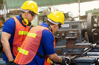 Technicians Working On Machine
