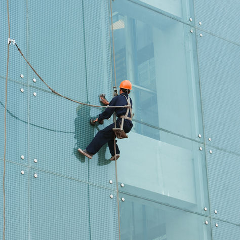 Conquering Heights: The Art of Climbing a Tower to Fix a Window