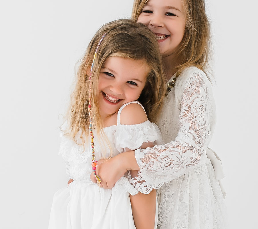 Smiling Girls Hugging