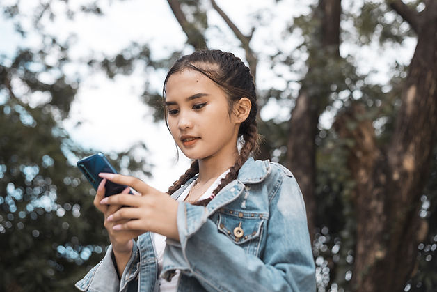 Teen Using Phone