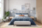 A bedroom with a blue and grey colour scheme, featuring a bed with pillows