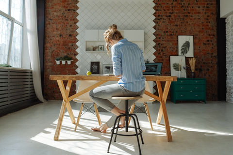 a lady sitting on chair