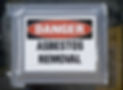 Danger Asbestos Removal Sign posted on school window