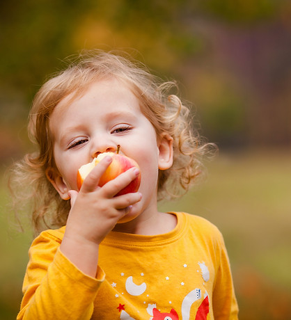 Cute Girl Eating Apple