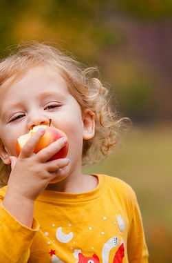Cute Girl Eating Apple