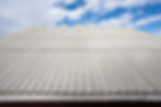 A angled rooftop on a cloudy day