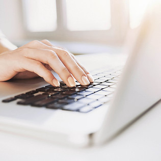 Typing on Laptop