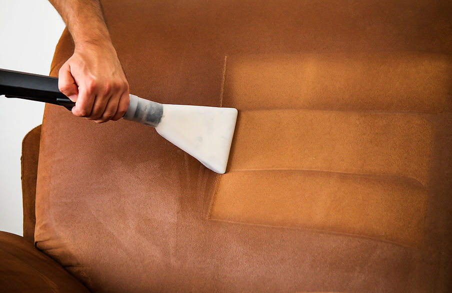Professional cleaning of the upholstery on a sofa