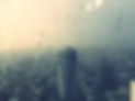 Cityscape Seen From Wet Glass Window In Rain