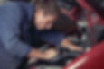 Mechanic at work fixing car