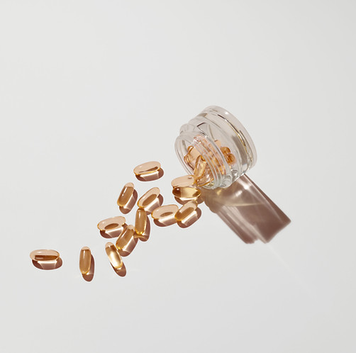 Spilled vitamin capsules