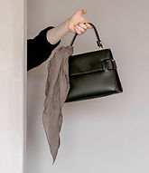 Hand Holding Handbag