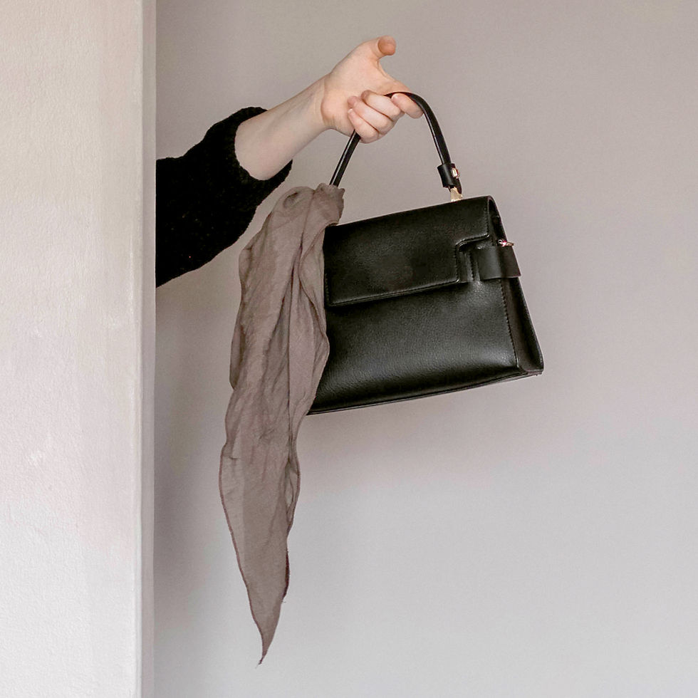 Hand Holding Handbag