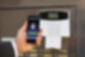 Businessperson Hand Holding Smartphone For Arming The System
