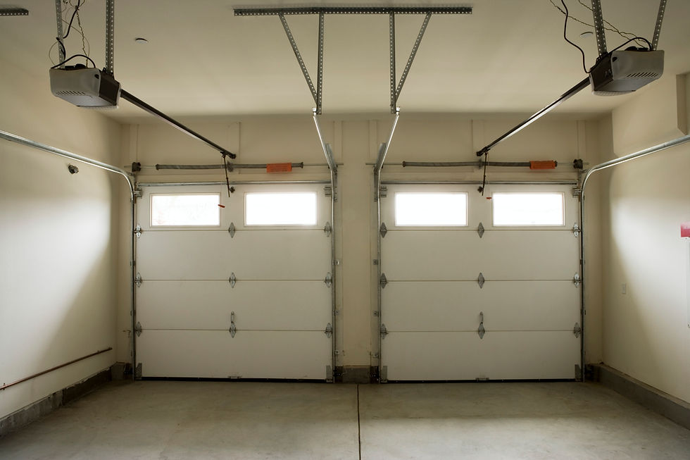 Empty room with glass doors leading to a balcony