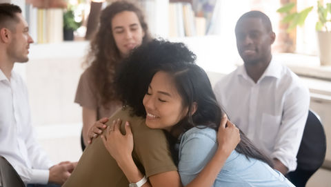 A Supportive Hug between group support members