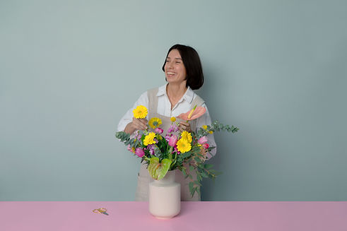 Woman Arranging Flowers