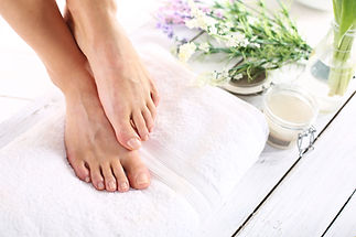 Beautiful feet of a woman during treatments