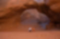 Yoga under sandstone arch