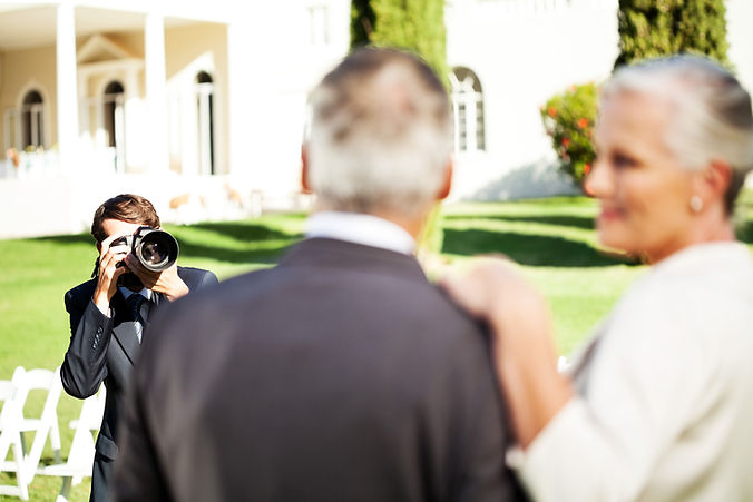 Photographer capturing couple