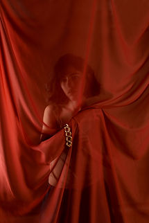 Behind Red Curtains