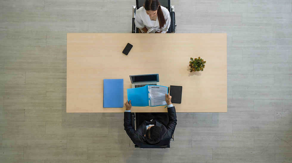 Candidate and interviewer in a consulting case interview setting at McKinsey, BCG, or Bain