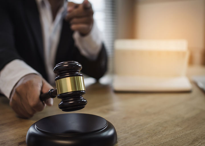 Gavel being swung within a court room
