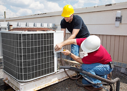 HVAC Workers Repairing