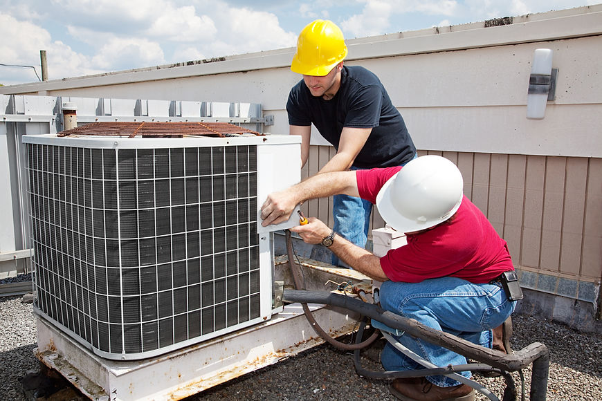 HVAC Workers Repairing