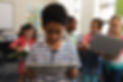 Schoolboy Using Tablet  