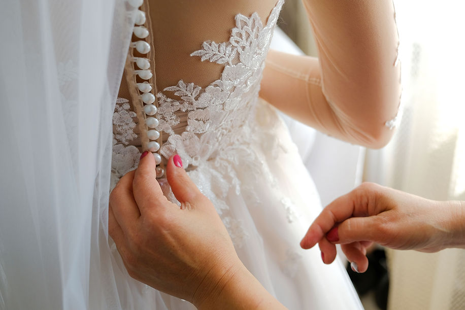 Buttoning Up a Wedding Dress